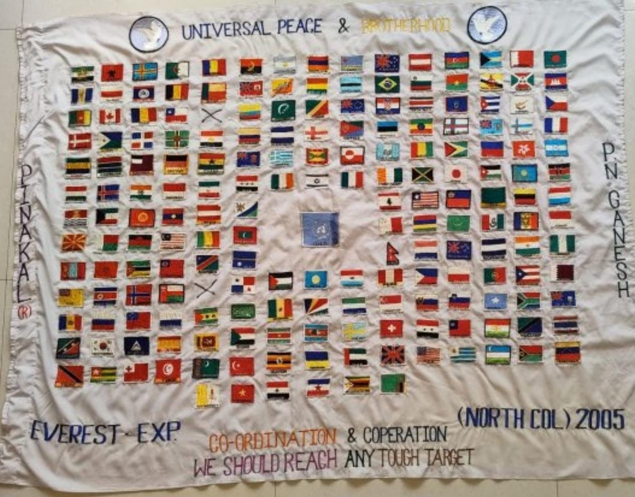 Hand-stitched banner of national flags from the 2005 Everest expedition to the North Col